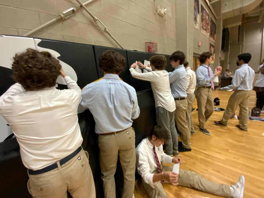 A group of sophomore students making their paper airplanes.