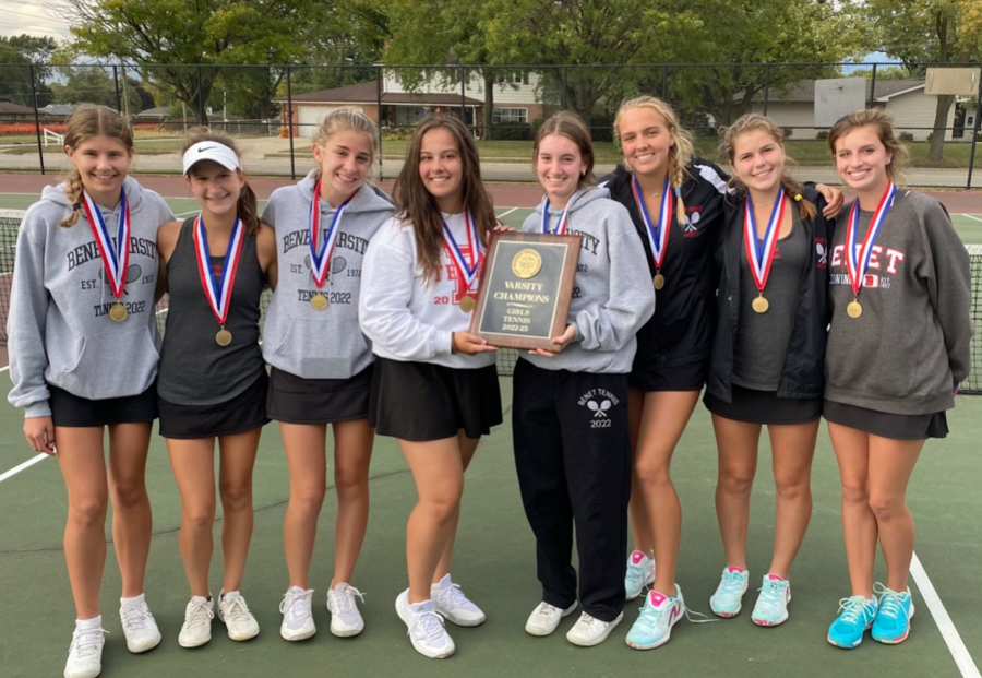 The+Benet+Academy+girls+varsity+tennis+team+show+off+their+conference+win.+