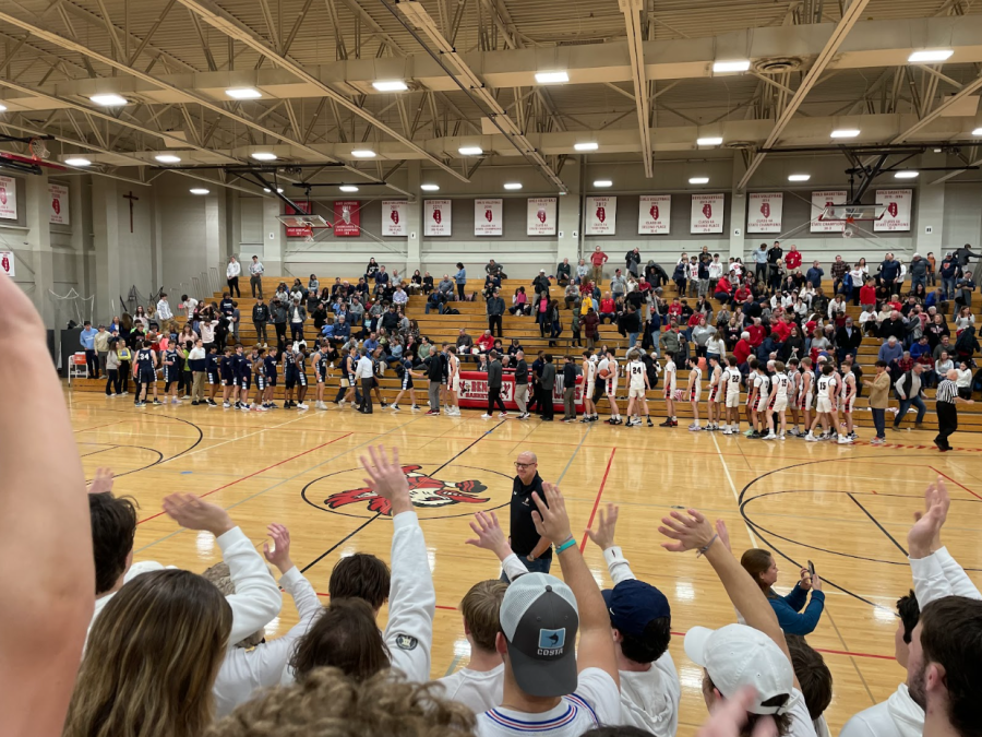 Benet+Academy+students+cheer+on+their+basketball+team+in+the+game+against+Nazareth+Academy.