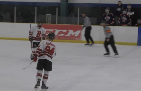 The Benet Academy Boys’ Hockey Team skates during the State Playoffs. 