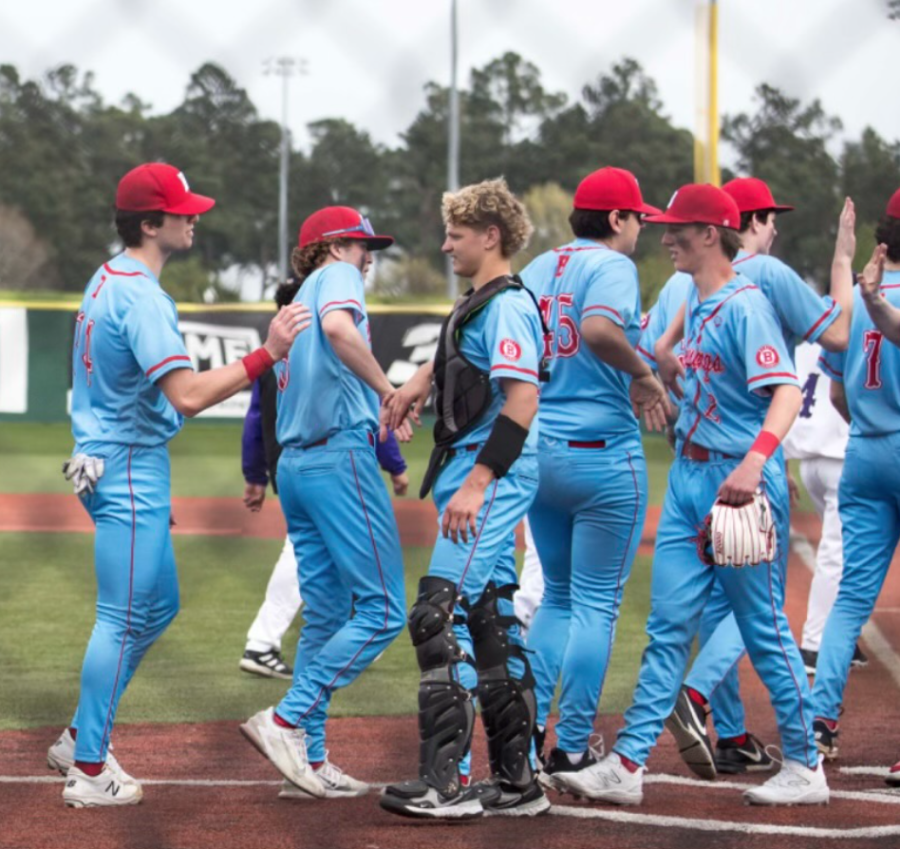The Benet Academy boys baseball team celebrate after a win in Myrtle Beach, South Carolina. 