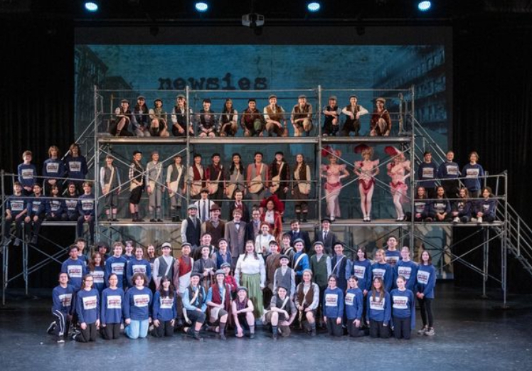Benet Academy Students “Seize the Day” in Production of Newsies
