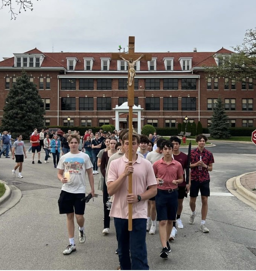 Benet Students participate in the annual Eucharistic Procession between Benet and Chesterton Academy of the Holy Family, also located in Lisle.