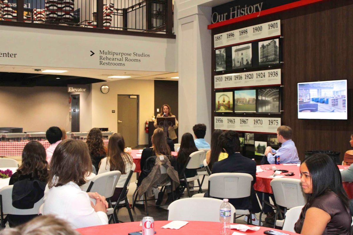 Scholars listen to Principal Costello speak on true leadership.