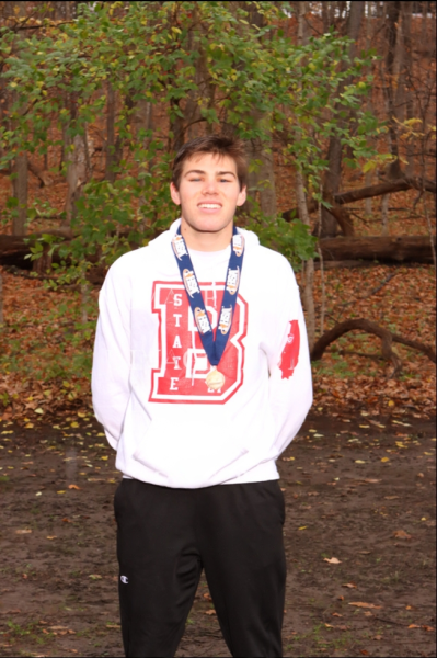 Benet Academy senior Finn Richards won the IHSA Cross Country race in the 2A Class.