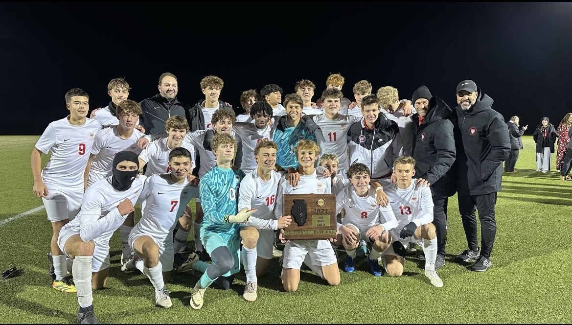 A photo of the Boys Soccer team after their defeat of Wheaton Academy.