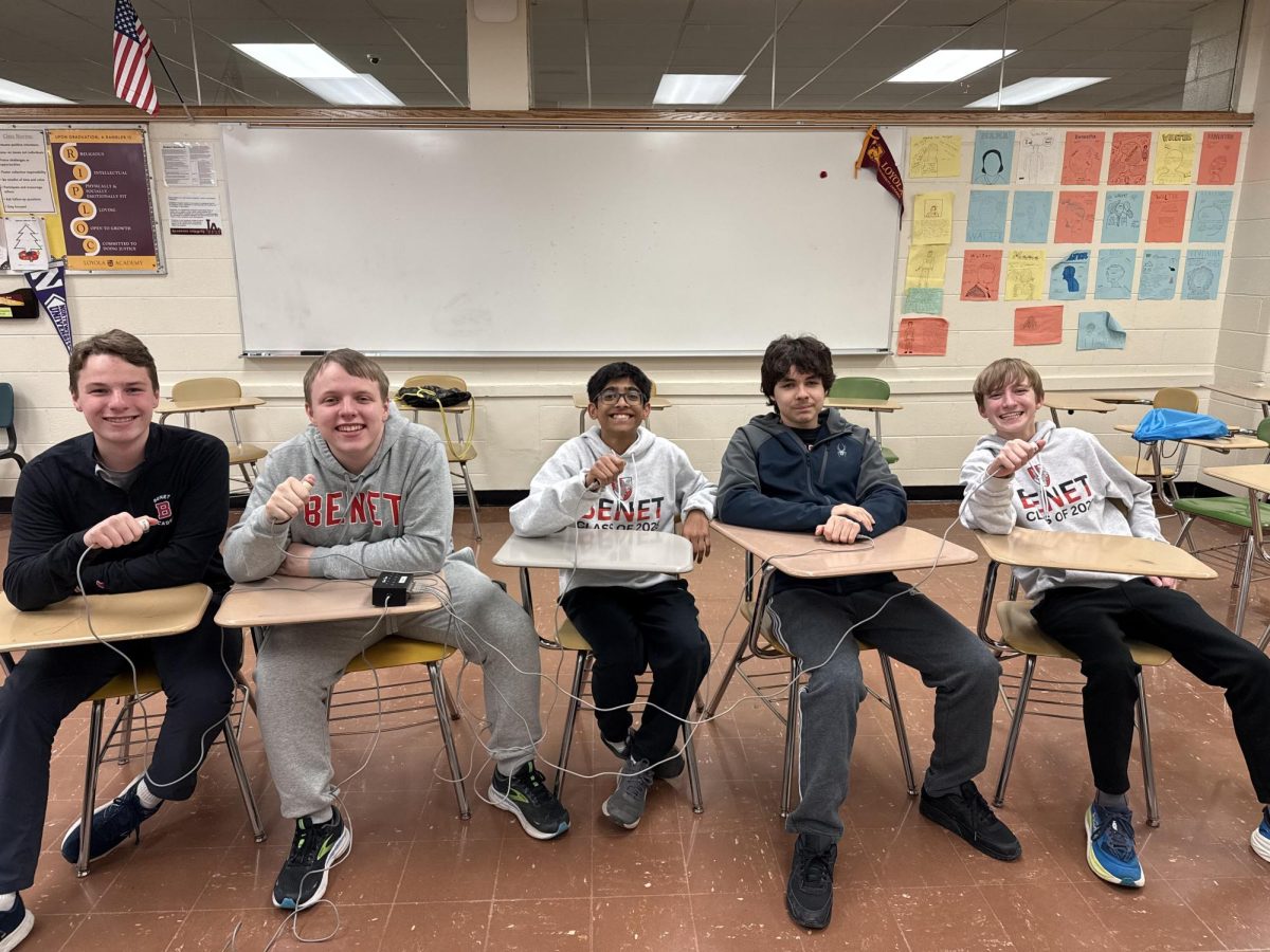 A photo of some of the members of the 2025 Benet Academy Scholastic Bowl Team. From left to right: Peter Warren of the class of 2028, John Augustyn of the class of 2025, George Pallan of the class of 2028, Ezra Guzman of the class of 2027, and Aiden Lile of the class of 2028.
