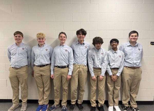 Benet’s Scholastic Bowl team at the Masonic Bowl. From left to right: Jack Oleniczak, Santi Regan-Rojas, Peter Warren, Packey Malloy, Ezra Guzman, George Pallan, Cruz Jones